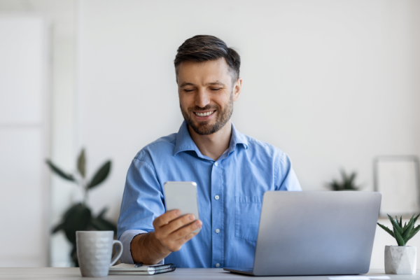 Mike Checks His Devices For Email 600X400